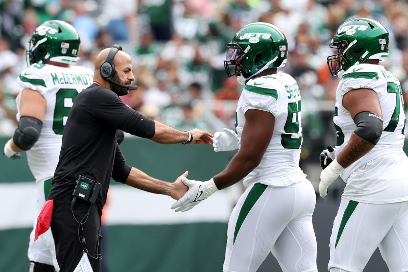 Head coach Robert Saleh of the New York Jets congratulates Nathan Shepherd #97 after a field goal against the Cincinnati Bengals during the first quarter at MetLife Stadium