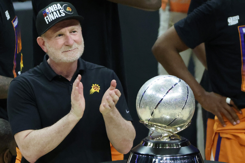 Owner Robert Sarver stands with the Western Conference Championship trophy after the Suns beat the LA Clippers to win the series in Game Six of the Western Conference Finals
