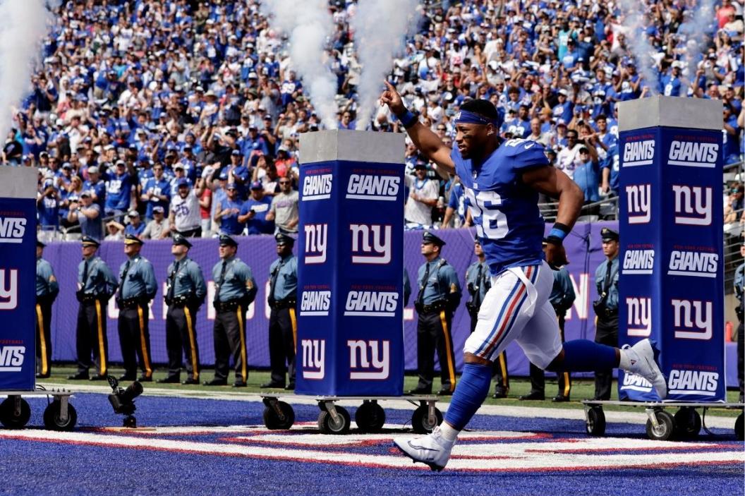 Saquon Barkley #26 of the New York Giants is introduced before a game against the Carolina Panthers