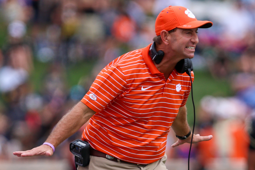 Head Coach Dabo Swinney of the Clemson Tigers yells instructions to his team on the field during a football game between the Wake Forest Demon Deacons