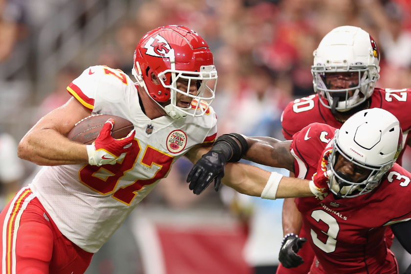 Tight end Travis Kelce #87 of the Kansas City Chiefs makes a reception against safety Budda Baker #3 of the Arizona Cardinals