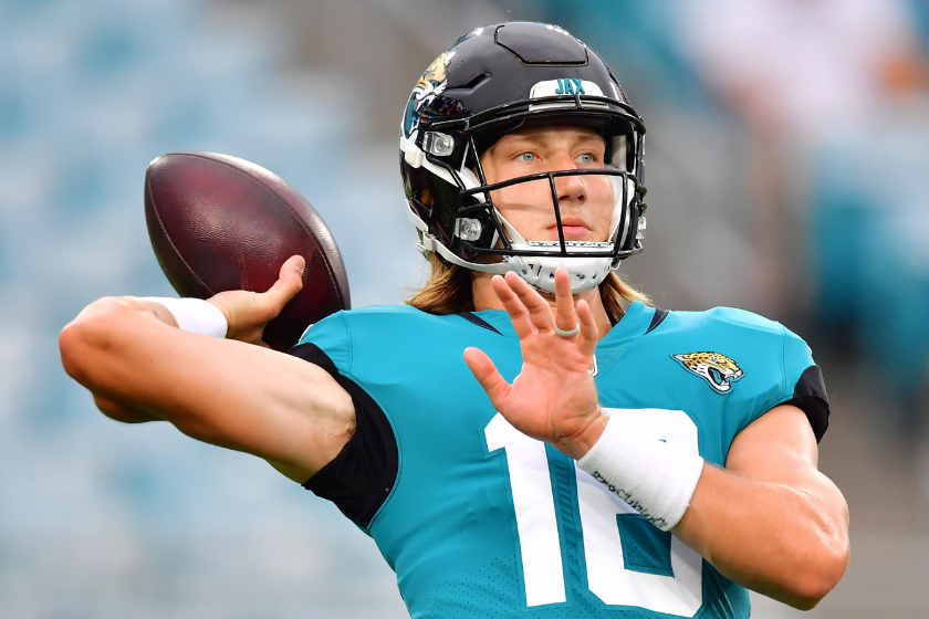 Trevor Lawrence #16 of the Jacksonville Jaguars throws a pass before a preseason game