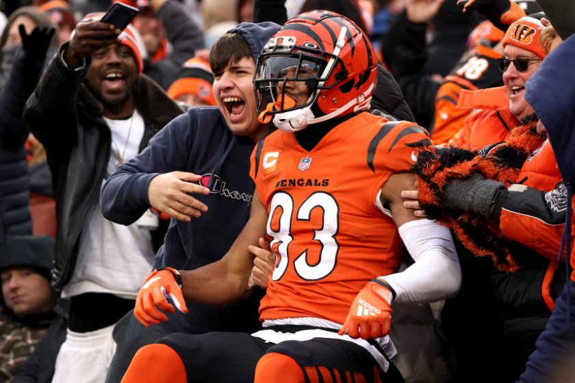 Tyler Boyd #83 of the Cincinnati Bengals celebrates with fans after a touchdown in the fourth quarter of the game against the Kansas City Chiefs at Paul Brown Stadium