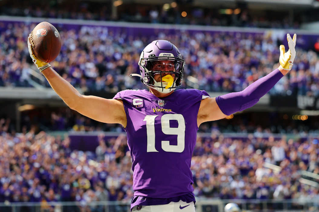 Wide receiver Adam Thielen #19 of the Minnesota Vikings reacts after scoring a touchdown in the second quarter of the game against the Detroit Lions