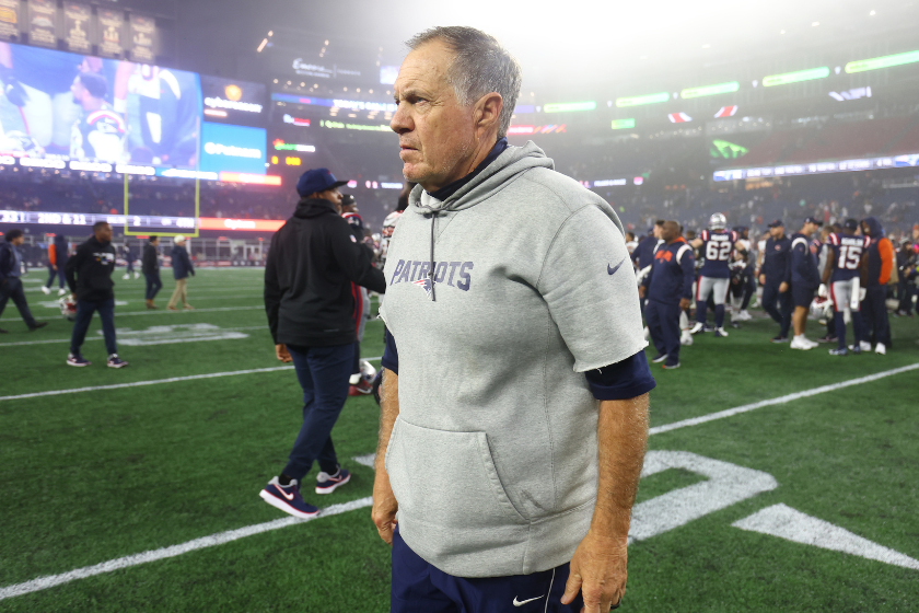 Head coach Bill Belichick of the New England Patriots walks on the field after being defeated by the Chicago Bears 33-14 at Gillette Stadium