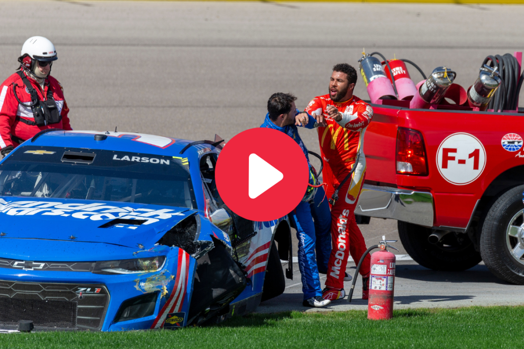 Bubba Wallace shoves Kyle Larson after they wrecked in the tri-oval before turn 1 during the 2022 South Point 400 at Las Vegas Motor Speedway