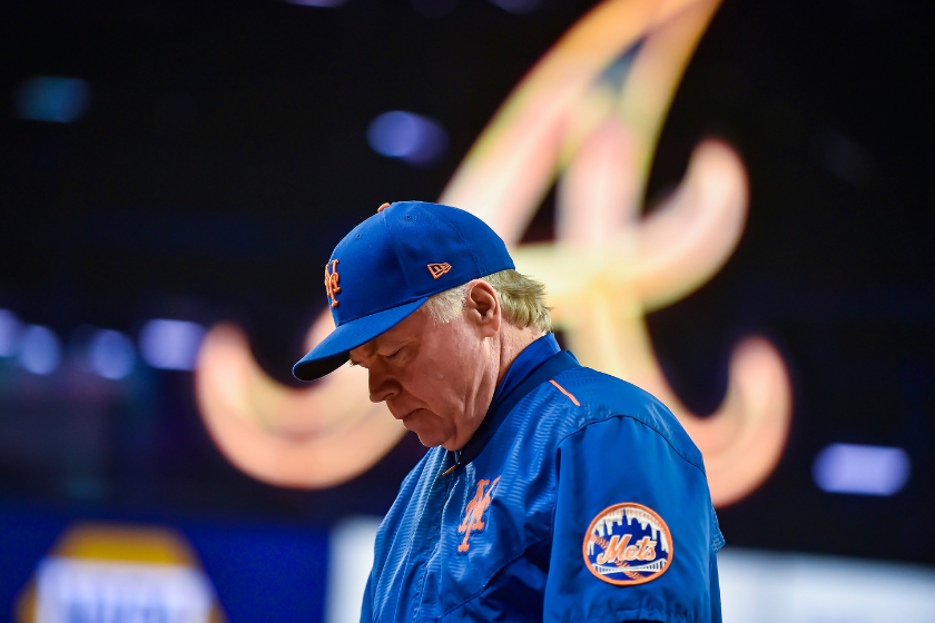 New York Mets manager Buck Showalter walks back to the dugout after a visit to the mound during the eighth inning of a MLB game between the New York Mets and Atlanta Braves