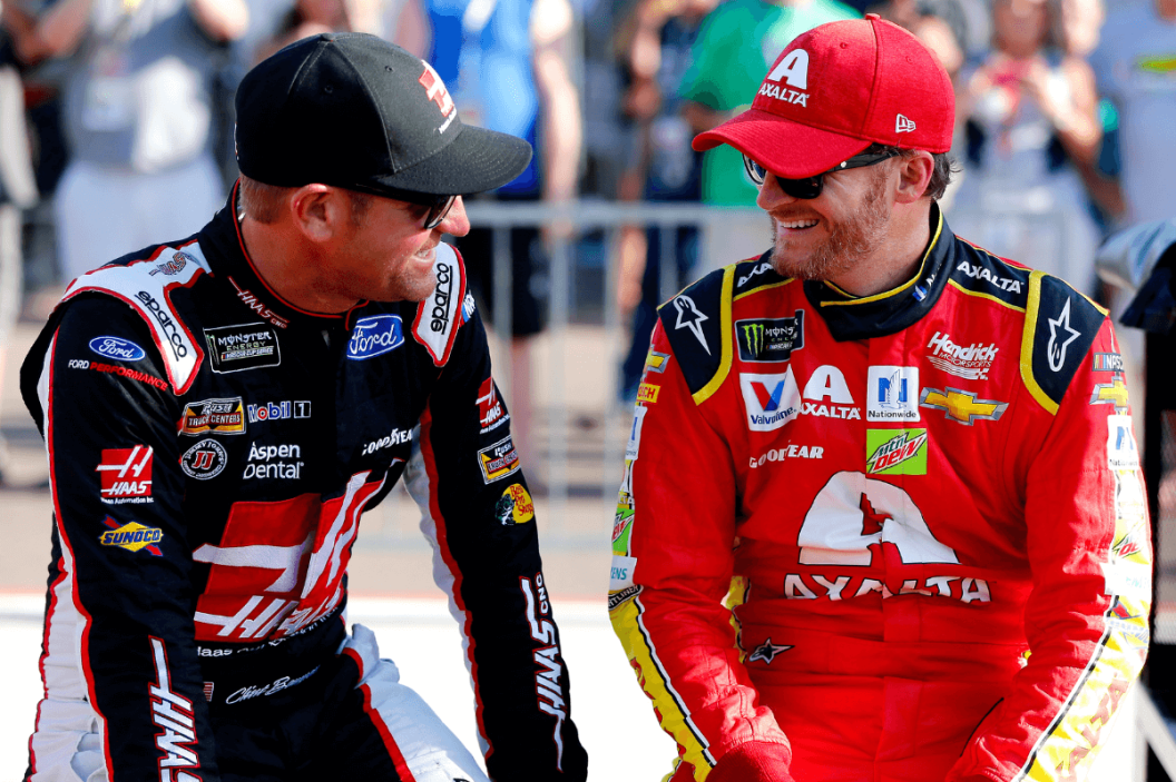 Clint Bowyer talks with Dale Earnhardt Jr. during qualifying for the 2017 Camping World 500 at Phoenix International Raceway