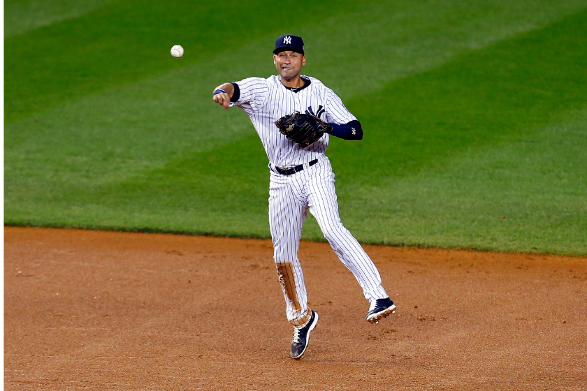 Derek Jeter throws to first against the Baltimore Orioles.