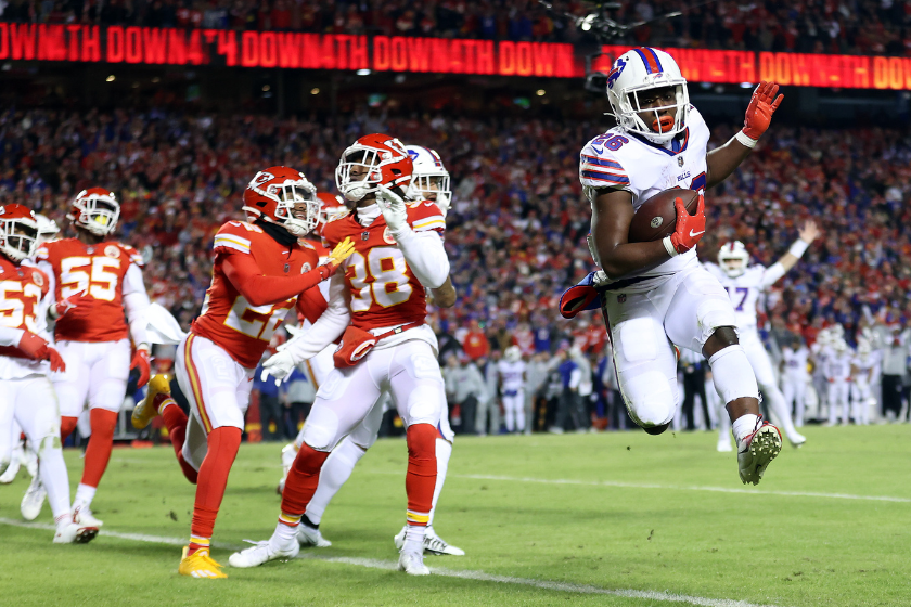 Devin Singletary #26 of the Buffalo Bills scores a touchdown against the Kansas City Chiefs during the first quarter in the AFC Divisional Playoff game 