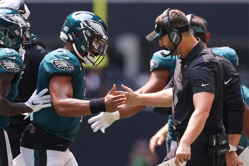 Jalen Hurts #1 and head coach Nick Sirianni of the Philadelphia Eagles celebrate a touchdown during the second quarter against the Atlanta Falcons