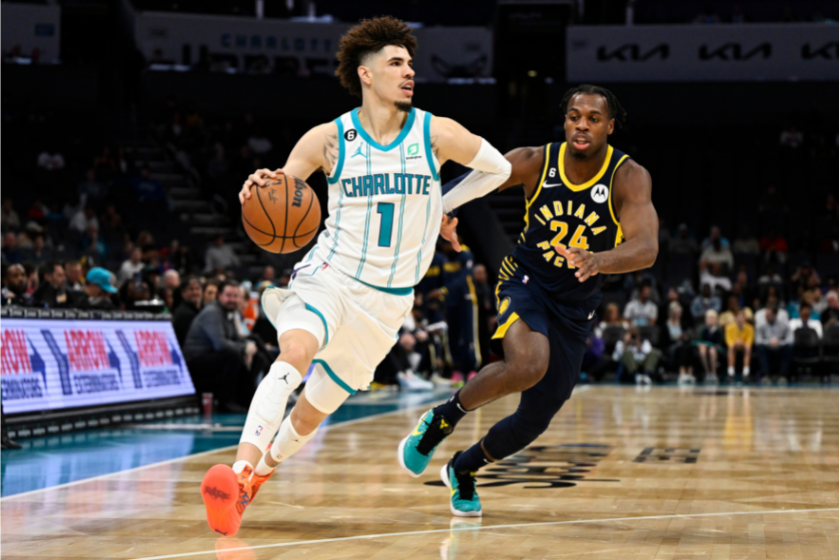 LaMelo Ball drives on the Indiana Pacers in an NBA preseason game.