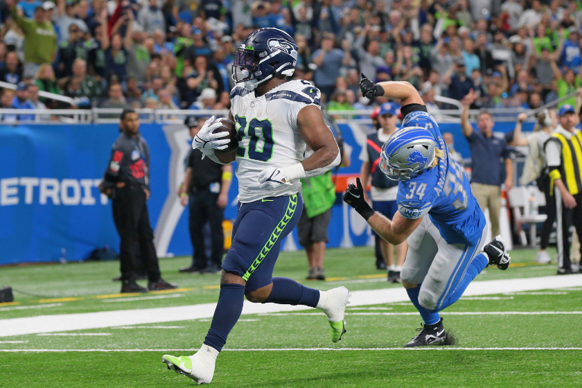 Seattle Seahawks running back Rashaad Penny (20) runs the ball during the first half of an NFL football game against the Detroit Lions