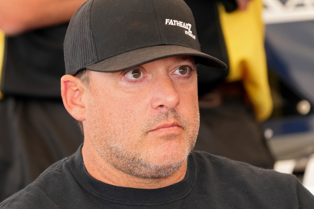 Tony Stewart looks on during a driver meeting during the Camping World Superstar Racing Experience at Nashville Fairgrounds Speedway on July 09, 2022