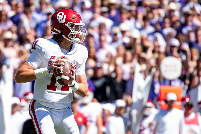 Quarterback Davis Beville #11 of the Oklahoma Sooners looks for an open teammate to throw to during the first half against the TCU Horned Frogs at Amon G. Carter Stadium on October 1, 2022 in Fort Worth, Texas.