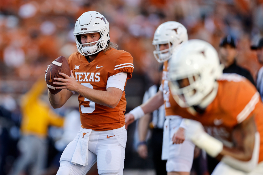 Quinn Ewers #3 of the Texas Longhorns warms up before the game against the West Virginia Mountaineers at Darrell K Royal-Texas Memorial Stadium on October 01, 2022 in Austin, Texas.