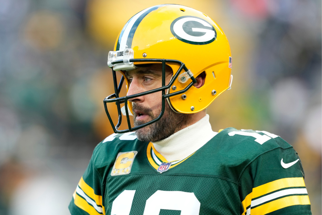 Aaron Rodgers #12 of the Green Bay Packers looks on during pregame against the Dallas Cowboys