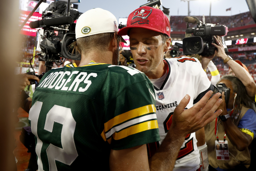 Aaron Rodgers #12 of the Green Bay Packers talks with Tom Brady #12 of the Tampa Bay Buccaneers after the game at Raymond James Stadium