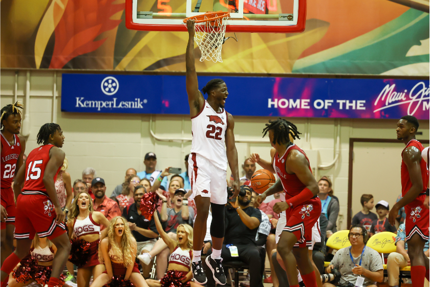 Arkansas' Makhel Mitchell dunks on Louisville in the Maui Invitational.