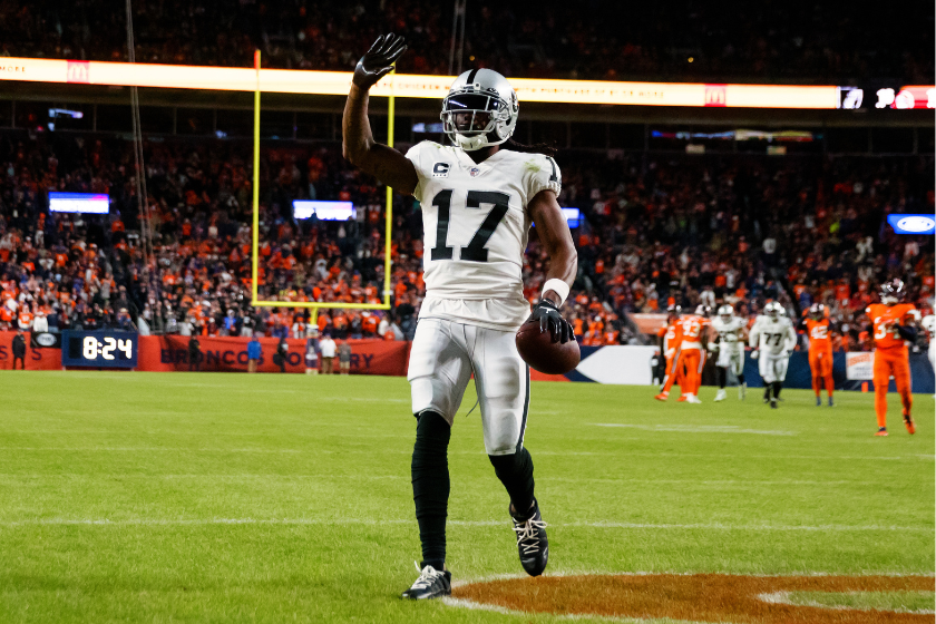 Wide receiver Davante Adams #17 of the Las Vegas Raiders waves to the crowd after catching a pass for a game-winning touchdown against the Denver Broncos during overtime
