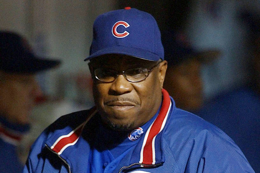 Manager Dusty Baker of the Chicago Cubs watches from the dugout in the first inning against the Florida Marlins in Game 6 of the National League Championship Series
