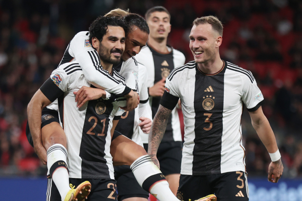 lkay Guendogan of Germany celebrates with teammates Leroy Sane and David Raum after scoring their side's first goal from the penalty spot during the UEFA Nations League League A Group 3 match