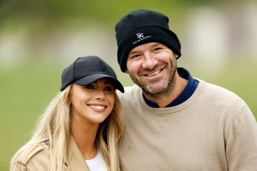 Tony Romo and his wife, Candice, at a golf event.