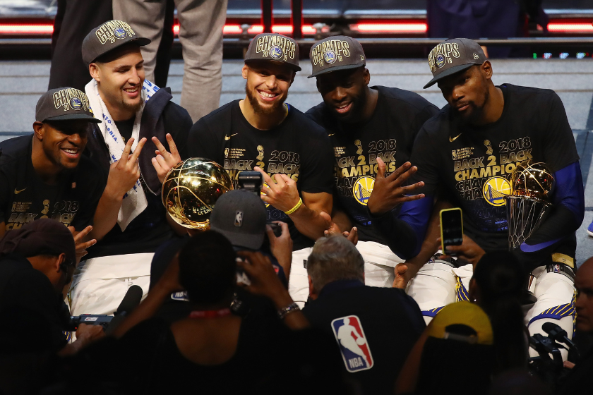  Andre Iguodala #9, Klay Thompson #11, Stephen Curry #30, Draymond Green #23 and Kevin Durant #35 of the Golden State Warriors celebrate after defeating the Cleveland Cavaliers during Game Four of the 2018 NBA Finals