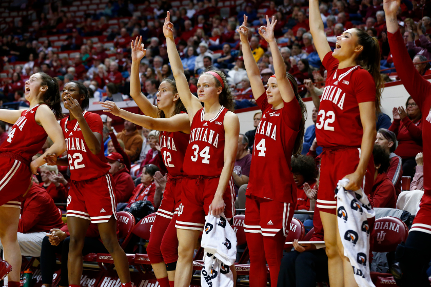  Indiana Hoosiers guard Grace Berger (34) and the rest of the Indiana bench celebrates a three pointer during a womens college basketball game