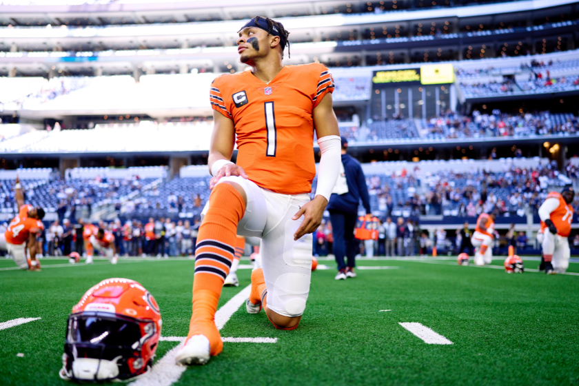 Justin Fields #1 of the Chicago Bears warms up before kickoff against the Dallas Cowboys at AT&T Stadium