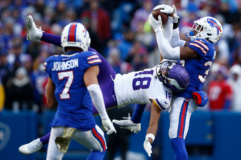 ustin Jefferson #18 of the Minnesota Vikings catches a pass in front of Cam Lewis #39 of the Buffalo Bills during the fourth quarter