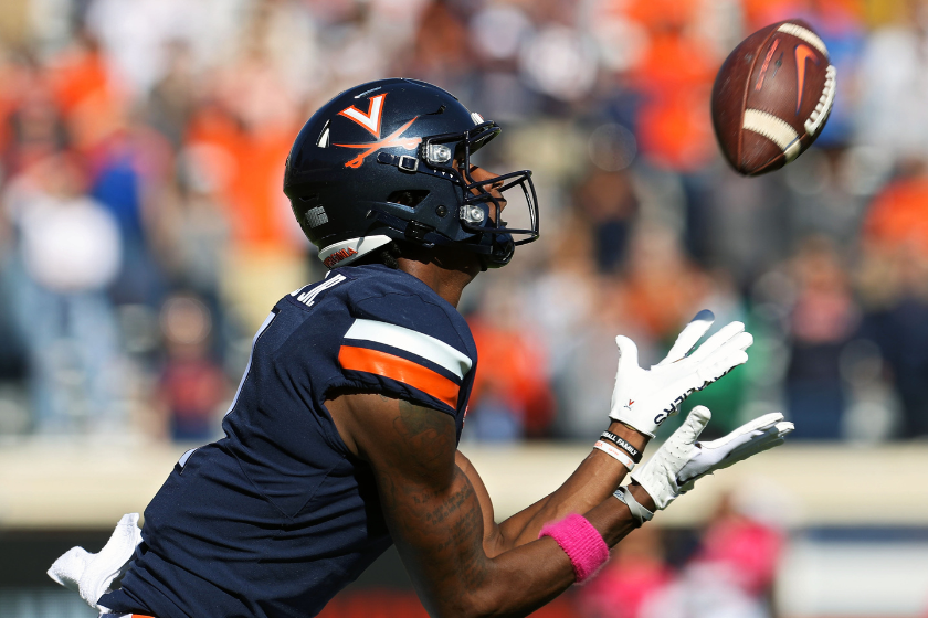 Lavel Davis Jr. #1 of the Virginia Cavaliers catches a deep pass in the second half during a game against the Miami Hurricanes