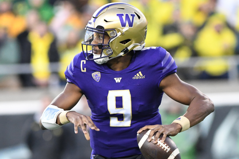 Quarterback Michael Penix Jr. (9) drops back to pass during a PAC-12 conference college football game between the Washington Huskies and Oregon Ducks