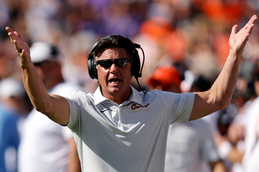 Head coach Mike Gundy of the Oklahoma State Cowboys reacts toward an official as Oklahoma State takes on the TCU Horned Frogs