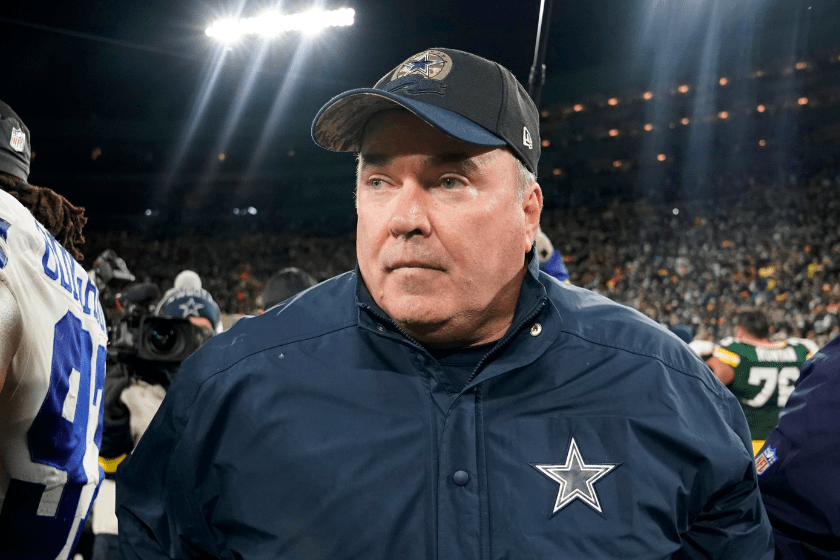 Head coach Mike McCarthy of the Dallas Cowboys walks off the field after his team's 31-28 loss in overtime against the Green Bay Packers