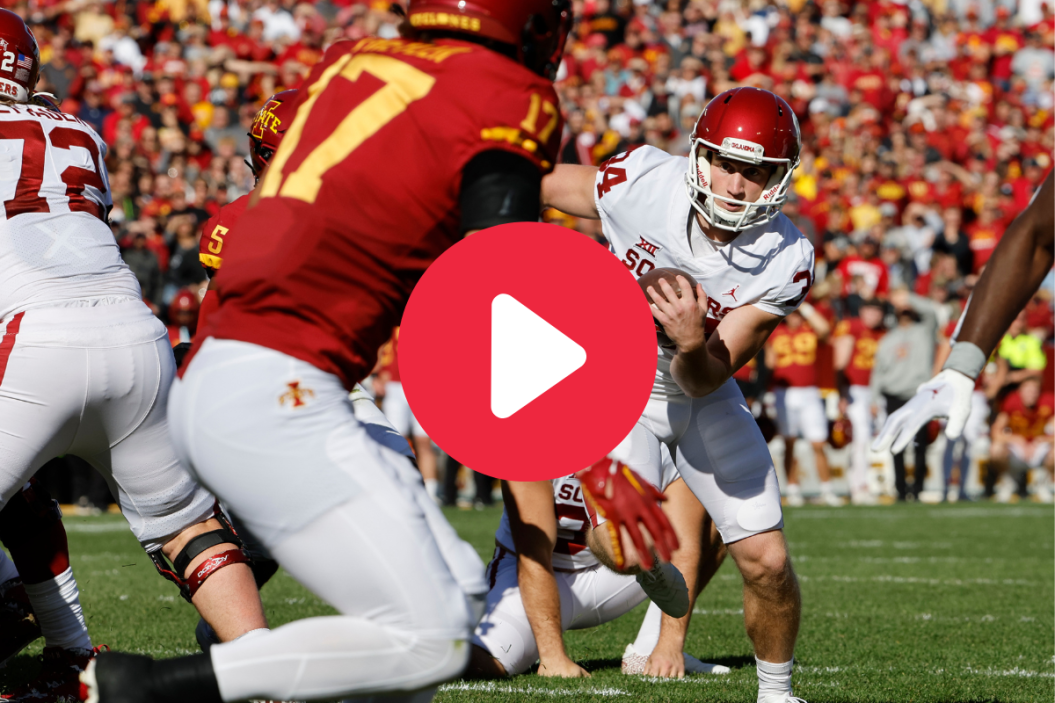 Place kicker Zach Schmit #34 of the Oklahoma Sooners faked a field goal kick and drove the ball into the end zone for a touchdown as defensive back Beau Freyler #17 of the Iowa State Cyclones defends