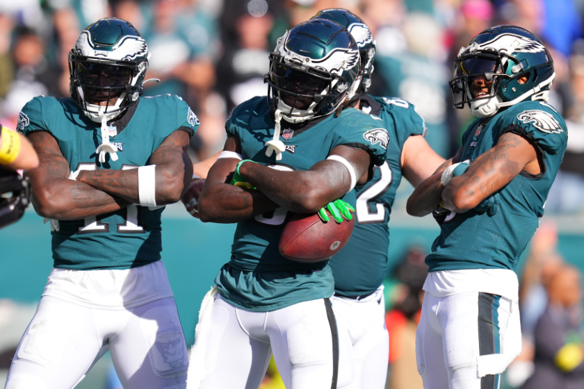 A.J. Brown #11, Zach Pascal #3 and DeVonta Smith #6 of the Philadelphia Eagles celebrates a third quarter touchdown during a game against the Pittsburgh Steelers