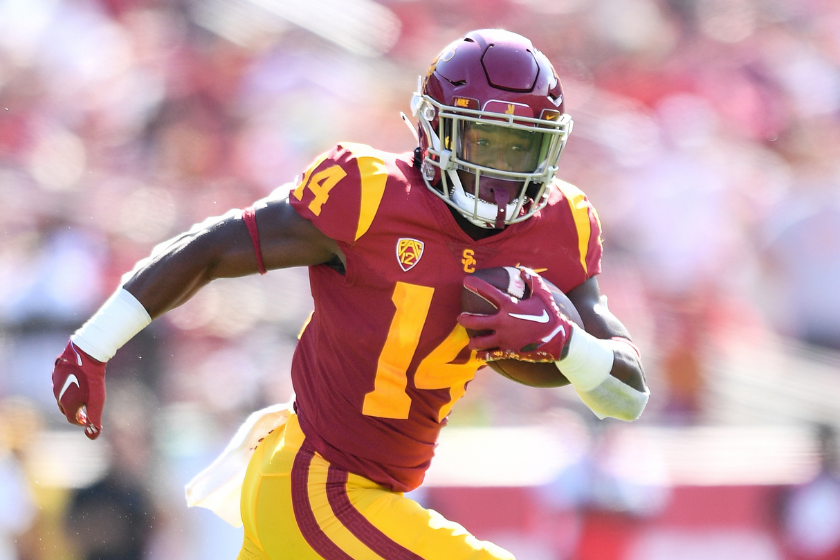 Running back Raleek Brown (14) runs the ball during a college football game between the Rice Owls and the USC Trojans