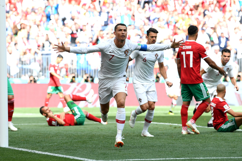 Cristiano Ronaldo of Portugal celebrates after scoring his team's first goal during the 2018 FIFA World Cup Russia group B match between Portugal and Morocco