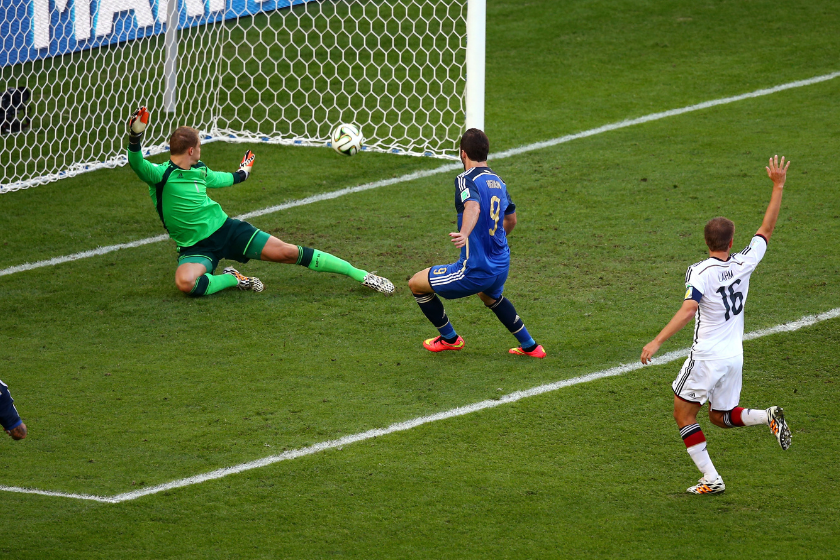 Gonzalo Higuain of Argentina scores a goal past Manuel Neuer of Germany but it is disallowed due to offsides being called during the 2014 FIFA World Cup Brazil Final match