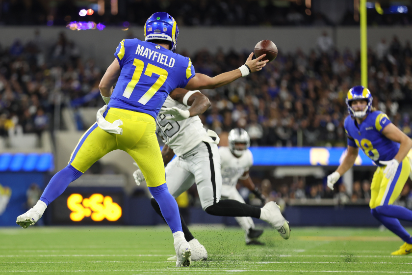 Baker Mayfield #17 of the Los Angeles Rams attempts a pass against the Las Vegas Raiders during the third quarter at SoFi Stadium
