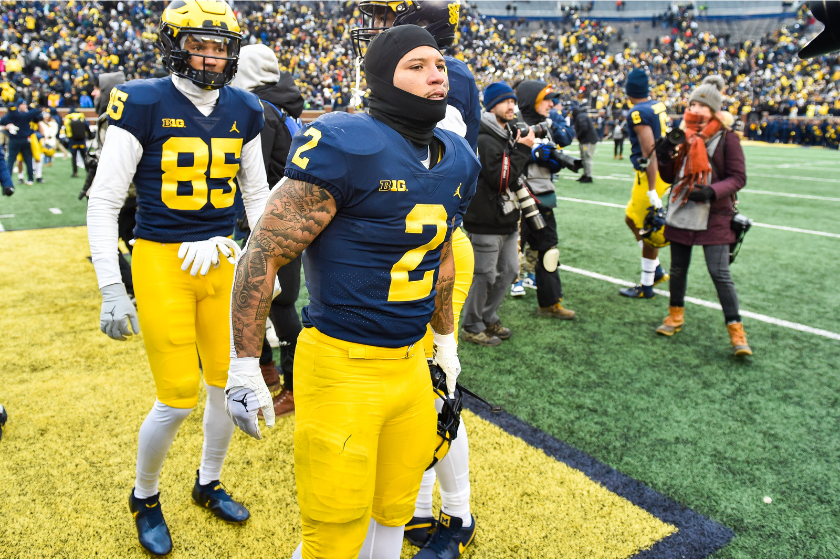 Blake Corum walking off the field after Michigan's win over Illinois.