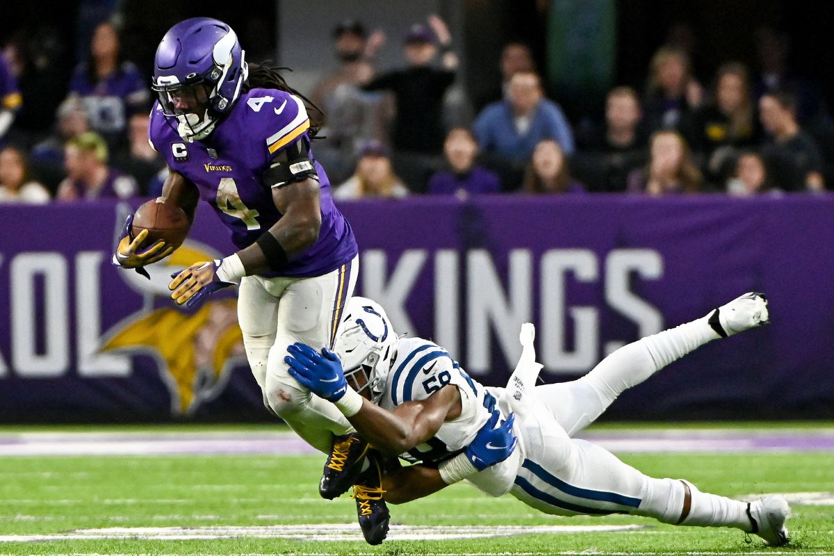 Dalvin Cook #4 of the Minnesota Vikings carries the ball against the Indianapolis Colts during overtime at U.S. Bank Stadium