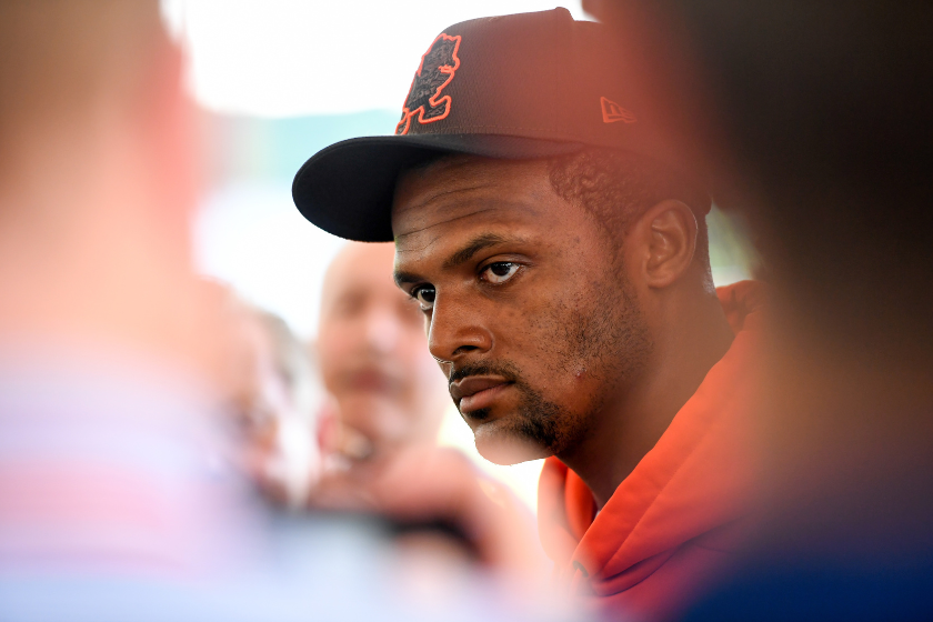 Deshaun Watson #4 of the Cleveland Browns listens to questions during a press conference prior to a joint practice with the Philadelphia Eagles at CrossCountry Mortgage Campus