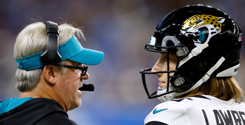 Head coach Doug Pederson of the Jacksonville Jaguars and Trevor Lawrence #16 look on during the second half of the game against the Detroit Lions at Ford Field