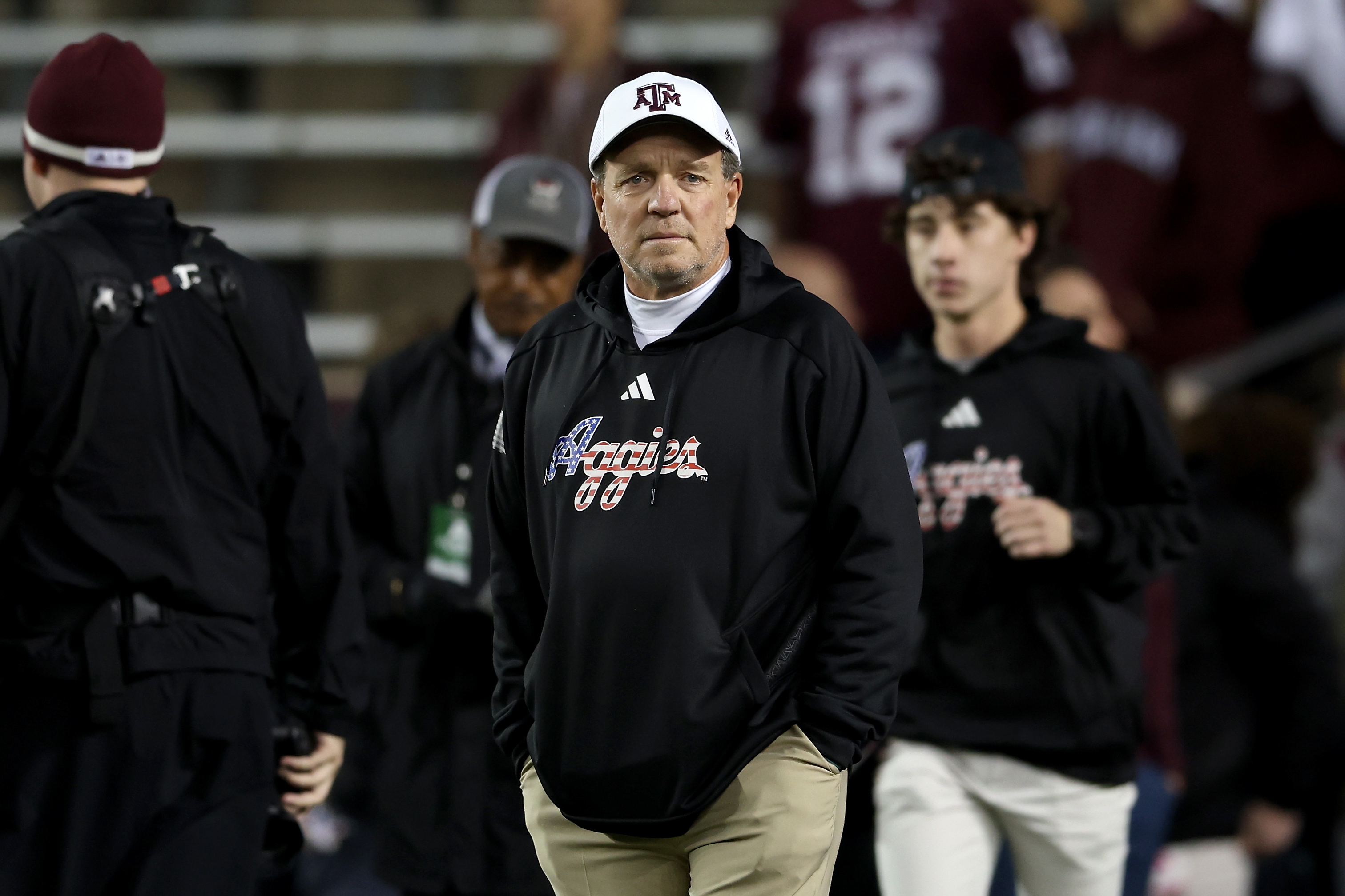 COLLEGE STATION, TEXAS - NOVEMBER 11: Head coach Jimbo Fisher of the Texas A&M Aggies watches players warm up before the game against the Mississippi State Bulldogs at Kyle Field on November 11, 2023 in College Station, Texas. 