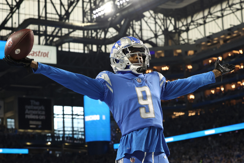 Jameson Williams #9 of the Detroit Lions celebrates a touchdown during the first quarter of the game against the Minnesota Vikings at Ford Field 