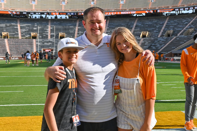 Tennessee head coach Josh Heupel poses with his son, Jace Heupel (left) and daughter Hannah Heupel (right), before the start of the college football game between the Akron Zips and the Tennessee Volunteers at Neyland Stadium