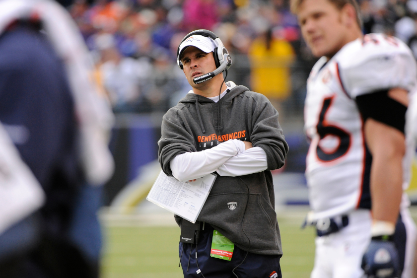 The Denver Broncos head coach Josh McDaniels watchs in the 2nd half vs the Baltimore Ravens at M&T Bank Stadium