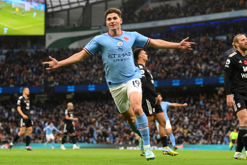 Julian Alvarez of Manchester City celebrates after scoring their team's first goal during the Premier League match between Manchester City and Fulham FC at Etihad Stadium